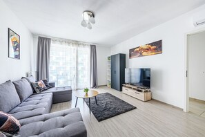 Apartamento, 1 quarto | Área de estar