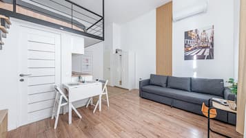 Apartment, 1 Bedroom | Living area | Flat-screen TV