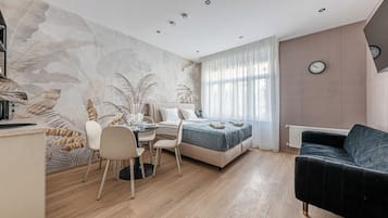 Appartement, 1 chambre | Aire de séjour | Téléviseur à écran plat