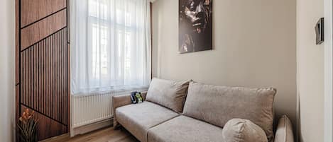 Apartment, 2 Bedrooms | Living area | Flat-screen TV