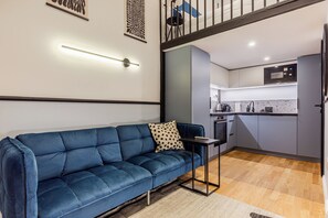 Apartment, 1 Bedroom | Living area | Flat-screen TV - Three Studios Collection (Budapest)