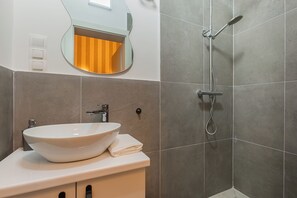 Apartment, 1 Bedroom | Bathroom | Shower, towels - Three Studios Collection (Budapest)