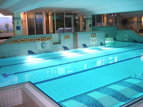 Cozy apartment with Alpine view + Balcony +POOL +Netflix +SAUNA +GYM