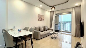 Deluxe Apartment, 2 Bedrooms, Non Smoking, City View | Living area | 24-inch flat-screen TV with digital channels - Sunrise City Premium Urban Residence (Ho Chi Minh City)