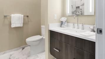 Shower, eco-friendly toiletries, hair dryer, towels