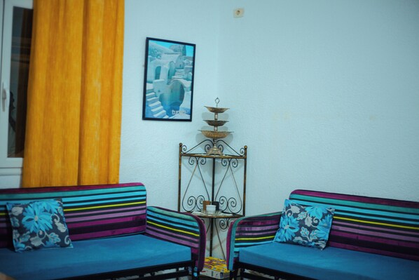 Apartment, 2 Bedrooms, Balcony, City View | Living area | 46-inch Smart TV with digital channels, video-game console