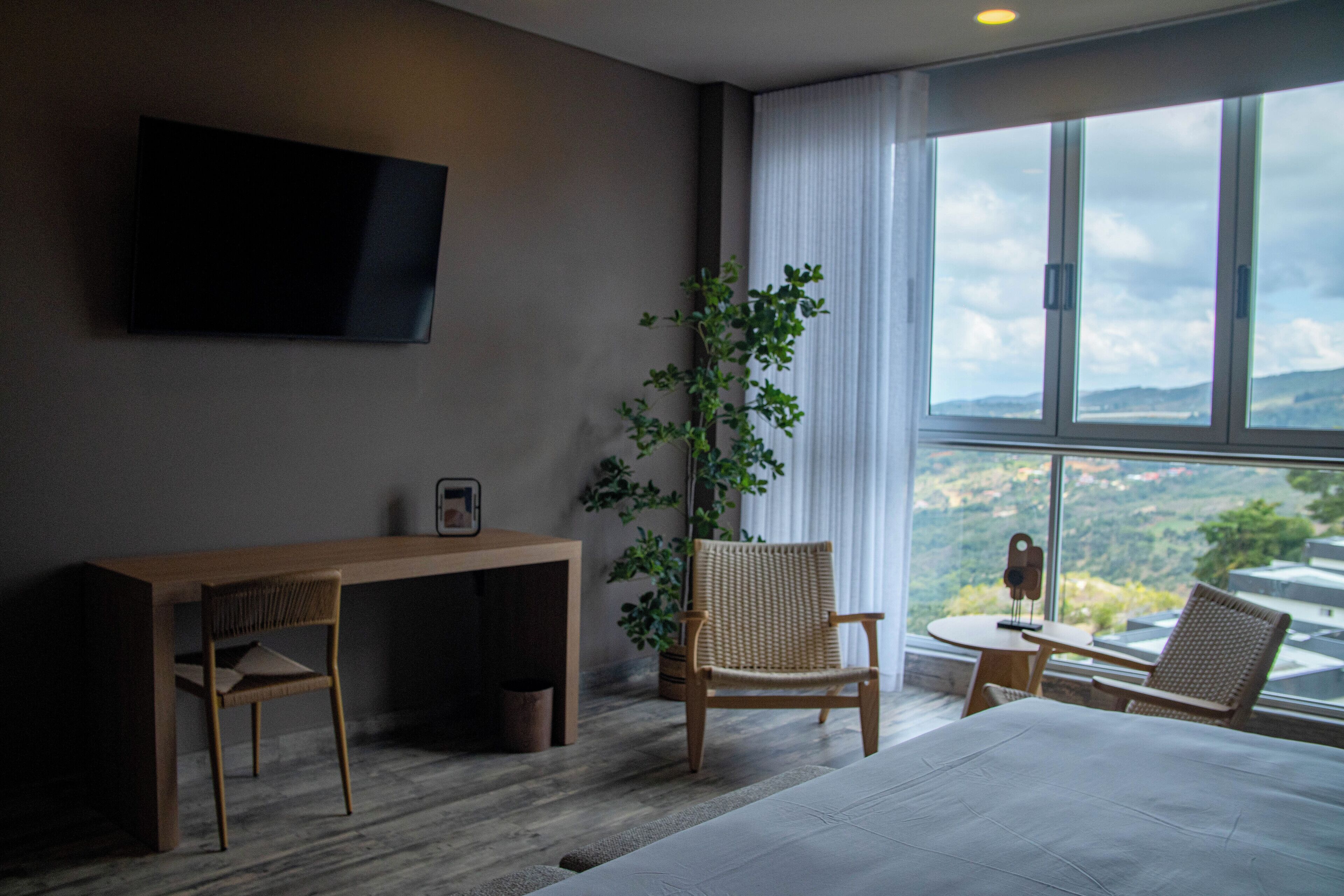 Suíte superior, vista para o jardim | Vista do quarto