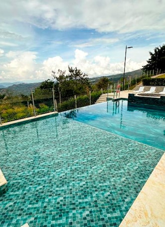 2 outdoor pools. Hotel Pauche