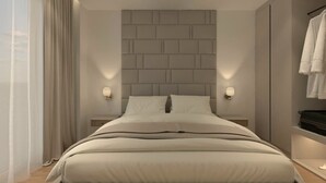 A modern bedroom with a large bed, two bedside lamps, and a headboard with a geometric design. - FAFA Mel Holiday Hotel (Golem)