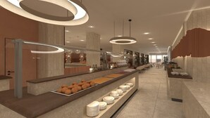 A modern hotel lobby with a long reception desk, a buffet area with various food items, and a seating area with tables and chairs. - FAFA Mel Holiday Hotel (Golem)