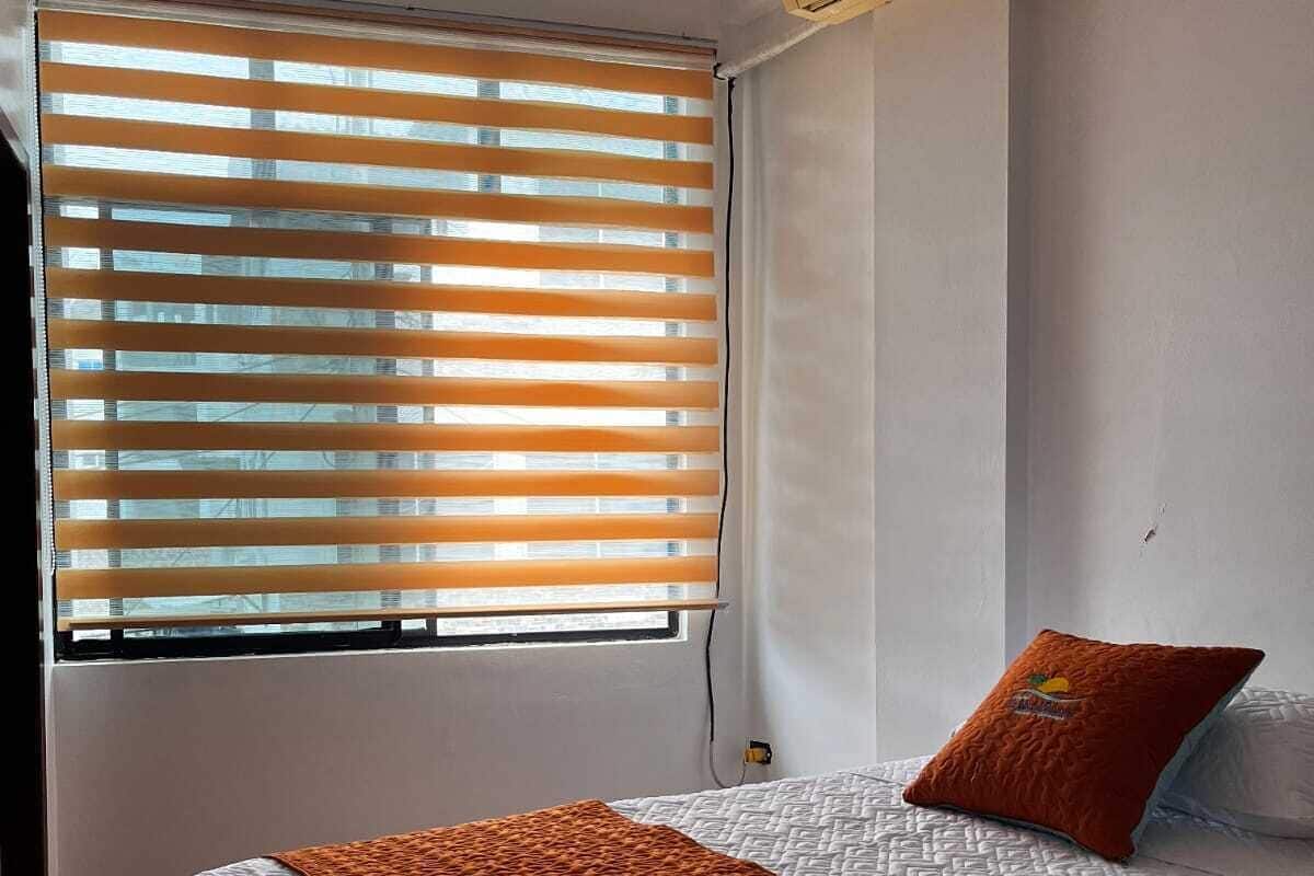 Basic-værelse til 4 personer - byudsigt | Gratis Wi-Fi, sengetøj