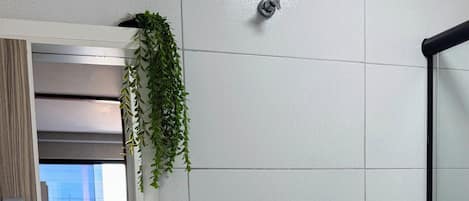 Shower, towels, soap, toilet paper