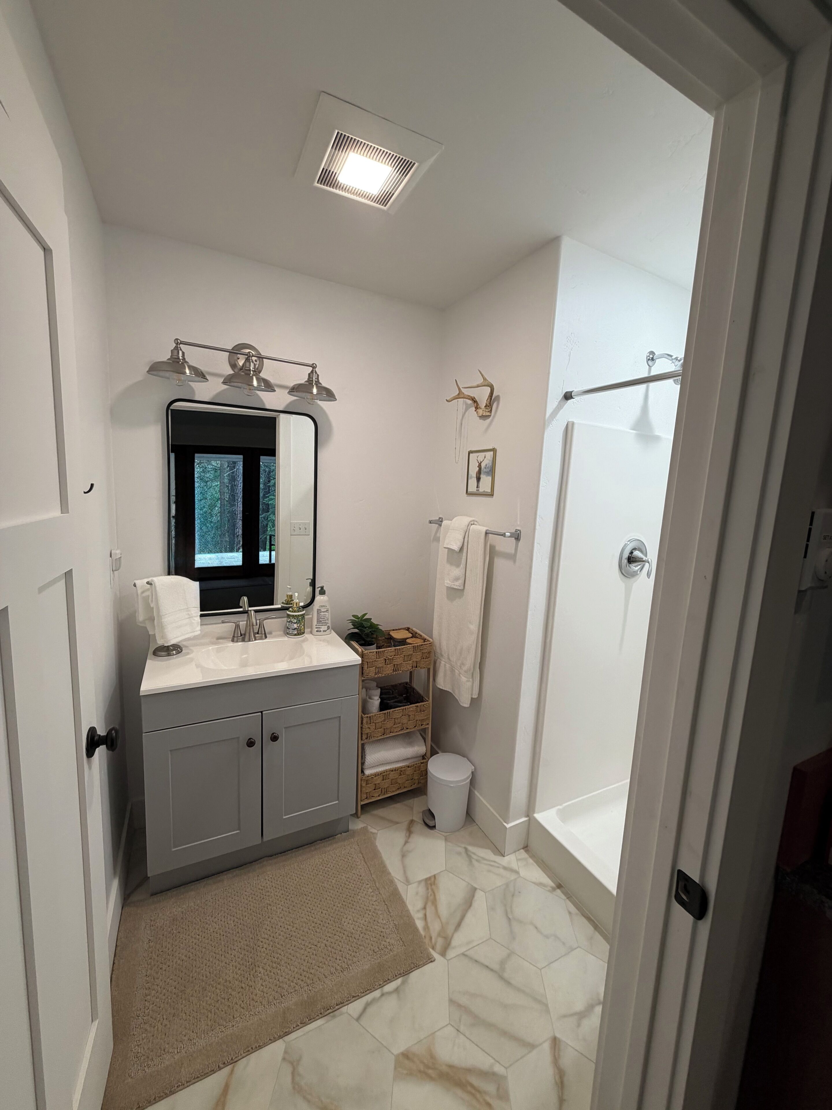 Shower, towels, soap, toilet paper