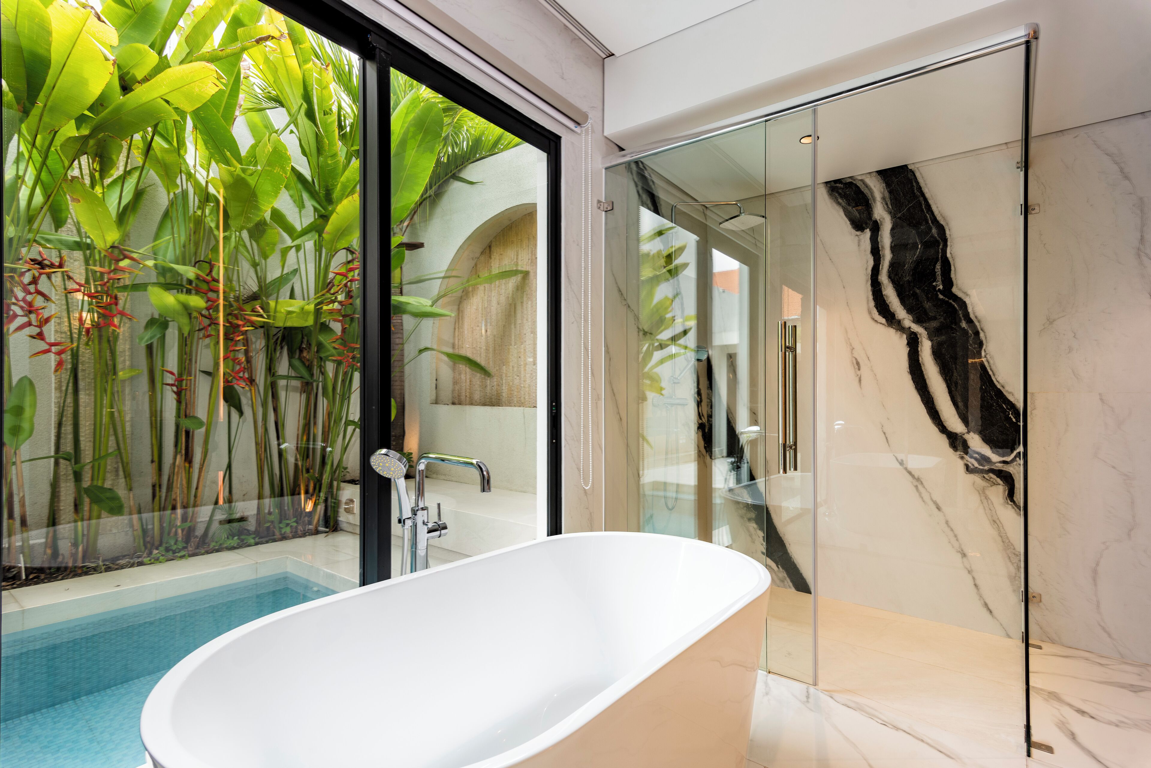 Separate bathtub and shower, free toiletries, towels, soap