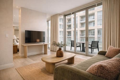 Suite Supérieure, 1 trÚs grand lit | Coin séjour