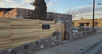 Oliver's Travels. Historic restored adobe centric studio.