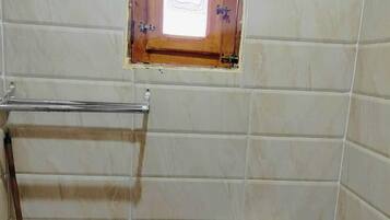 Shower, towels, soap, toilet paper