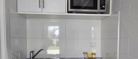 Deluxe Double Room, Courtyard View | Private kitchenette | Mini-fridge, microwave, electric kettle