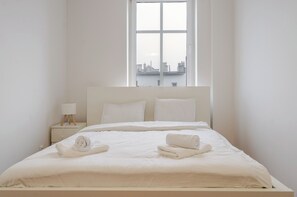 Fer et planche à repasser, draps fournis