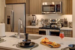 Fridge, microwave, oven, stovetop - Walkable Legacy West King Retreat with Pool (Plano)