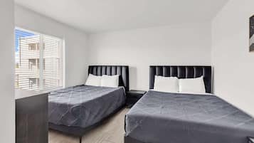 Iron/ironing board, travel crib, WiFi, bed sheets