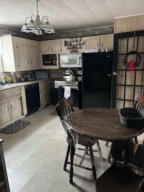Private kitchen - With a view of the famous Miramichi River....Come stay at  Poppy Jacks place.. (Gray Rapids)