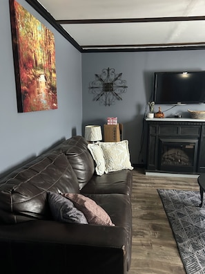 Living area - With a view of the famous Miramichi River....Come stay at  Poppy Jacks place.. (Gray Rapids)
