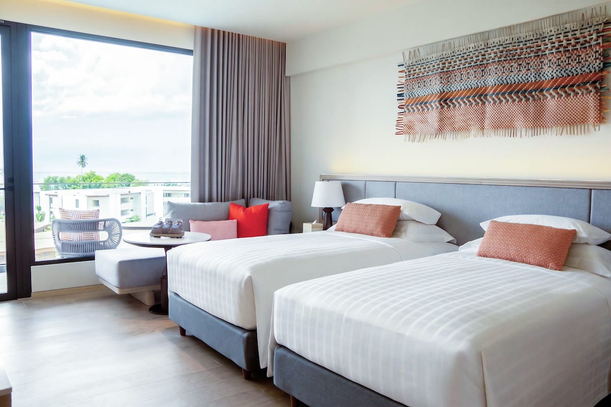 Deluxe Twin | Minibar, in-room safe, desk, free WiFi