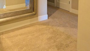A hallway with carpeted floors, white walls, and a door with a silver frame. - Beautiful 3-bedroom townhome with AC in charming Old Mill Area of Bend (Bend)