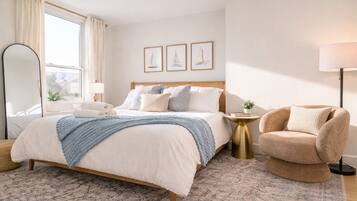 1 bedroom, desk, iron/ironing board, travel crib