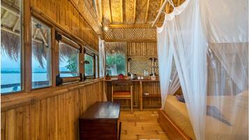 Deluxe Villa, 1 Queen Bed, Ocean View, Beachfront | Individually decorated, individually furnished, desk, laptop workspace