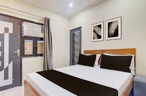 Habitación Deluxe | Camas supletorias, wifi gratis, ropa de cama