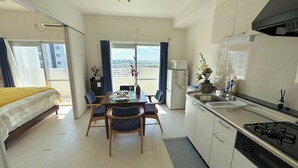 Living area - SunSea Okinawa Stunning Ocean View 2BR Sleeps 6 20 min from Airport 3 min to Shopping Mall (Urasoe)