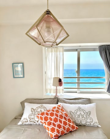Laptop workspace, blackout curtains, soundproofing, iron/ironing board. SunSea Okinawa Stunning Ocean View 2BR Sleeps 6 20 min from Airport 3 min to Shopping Mall