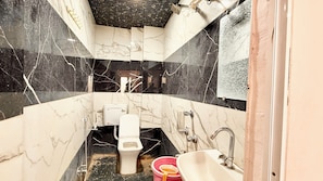 Shower, rainfall showerhead, free toiletries, bidet - Premium Hotel Sipra near Mahakal Temple (Ujjain)