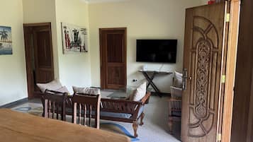 Deluxe Villa, 3 Bedrooms, Kitchen, Garden View | Living area | 30-inch LCD TV with satellite channels