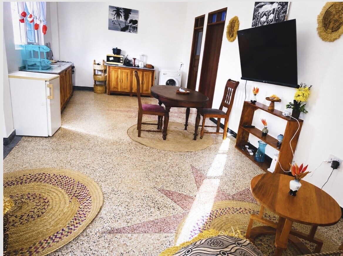 Comfort Apartment, 1 King Bed, Garden View | Living area | 30-inch LCD TV with satellite channels
