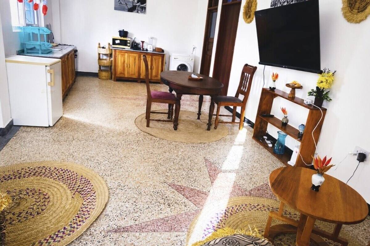 Comfort Apartment, 1 King Bed, Garden View | Living area | 30-inch LCD TV with satellite channels