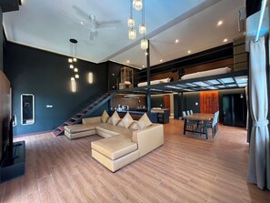 TV - Khaolak LOFT Suite A with 2 King size beds 1 bathroom at Kokotel Montana Hotel (Tambon Khuekkhak)