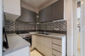 Fridge, microwave, dishwasher, toaster - GuestHost - A comfortable and welcoming 70 square meters apartment, perfect for four people, located on the fourth floor of a renovated building with an elevator (NOT accessible to disabled guests).The property is strategically located in the San Lorenzo (Rome)