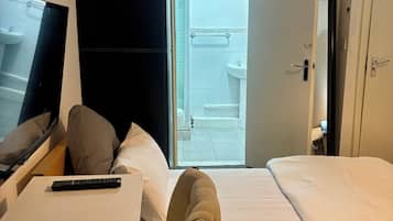 1 dormitorio, tabla de planchar con plancha, wifi gratis y ropa de cama