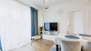 Appartement (11/16) | Aire de séjour | Téléviseur à écran plat