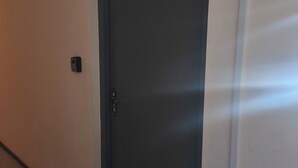 A closed door with a handle and a lock. - Snowy Loft Didveli (Bakuriani)