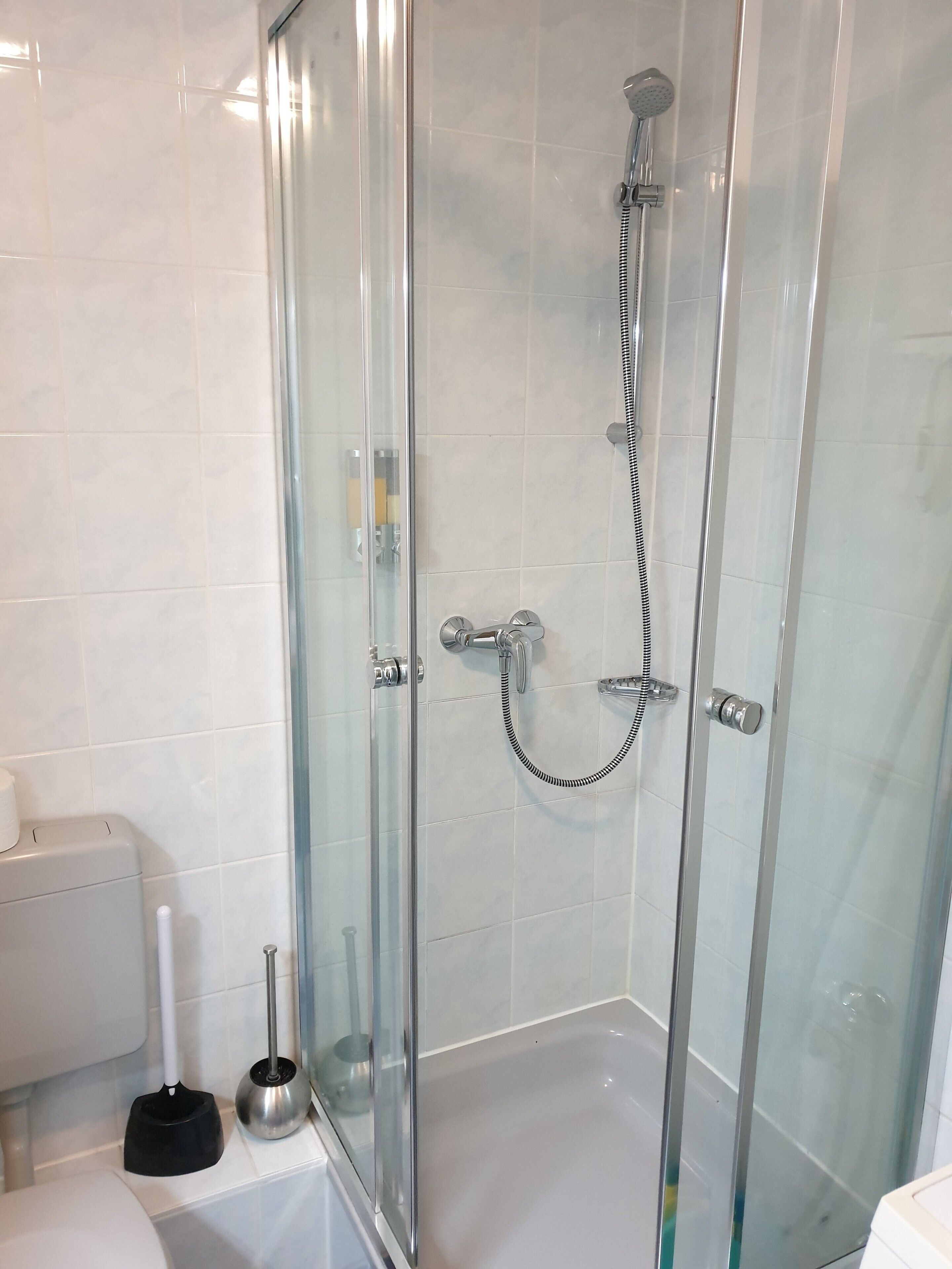 Shower, free toiletries, hair dryer, towels