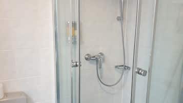 Shower, free toiletries, hair dryer, towels