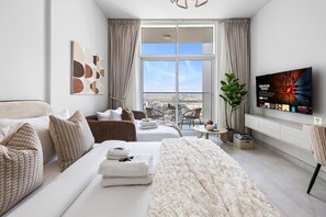 1 bedroom, iron/ironing board, WiFi, bed sheets - Cozy Studio with 31st Floor Miracle Garden View (Dubai)