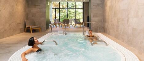 Sauna, hot tub, steam room, body scrubs, facials, massages