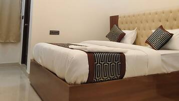 Quarto casal luxo, vista para a cidade | Área de estar