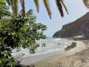Na praia, toalhas de praia 