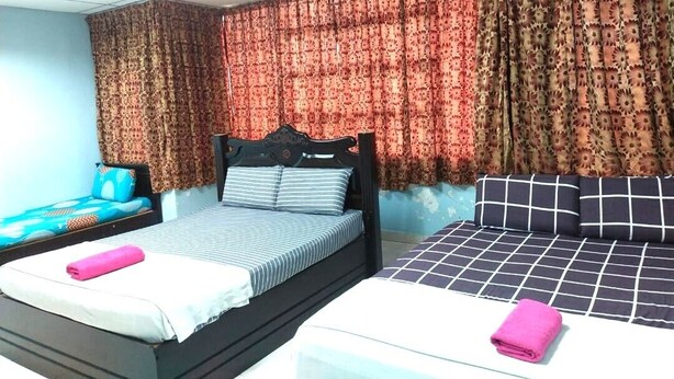 Deluxe Triple Room | WiFi (free), bed sheets - Capital O 91275 Pr Motel (Changlun)